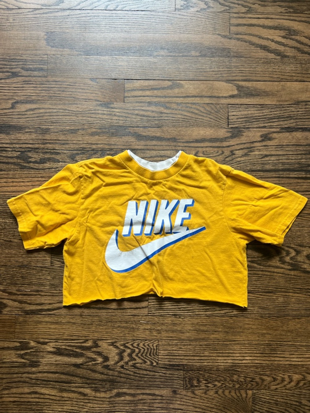 Vintage Nike Yellow Cropped Logo Tee with White and Blue Swoosh